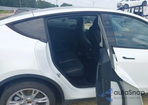 2023 Tesla Model Y Awd/Long Range Dual Motor All-Wheel Drive z USA, uszkodzony, nr VIN 7SAYGDEE8PA150850